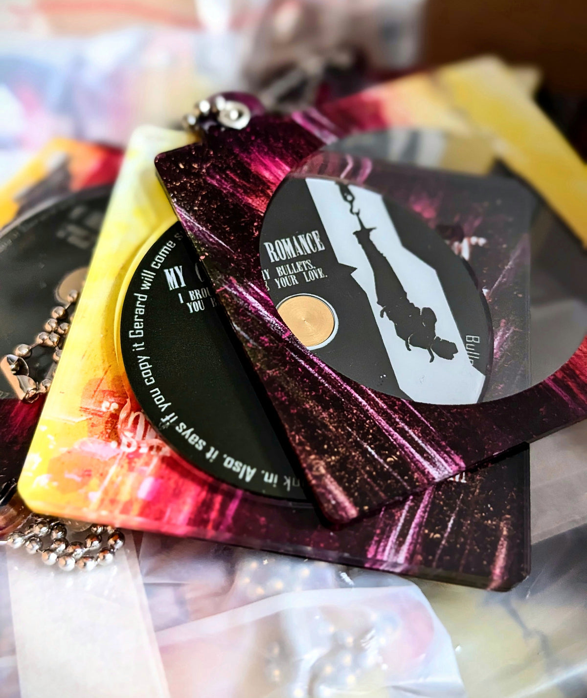 Bullets Spinning CD Acrylic Keychain